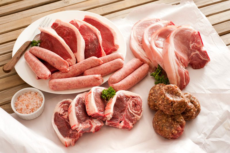 Assorted cuts of raw meat Assorted cuts of raw meat